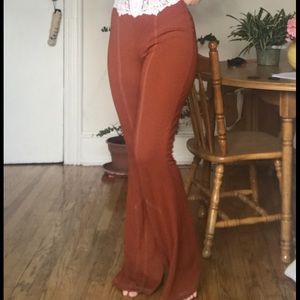 Runs big!! Orange bell bottom stretch pants!🧡